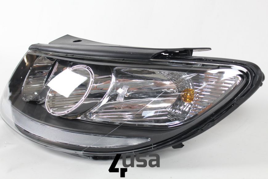 Фара передня біла права ліва Hyundai Santa Fe 2007 2008 92101-0W050 фото